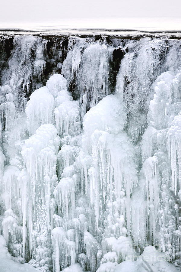Frozen Water Fall Photograph by Olivier Le Queinec