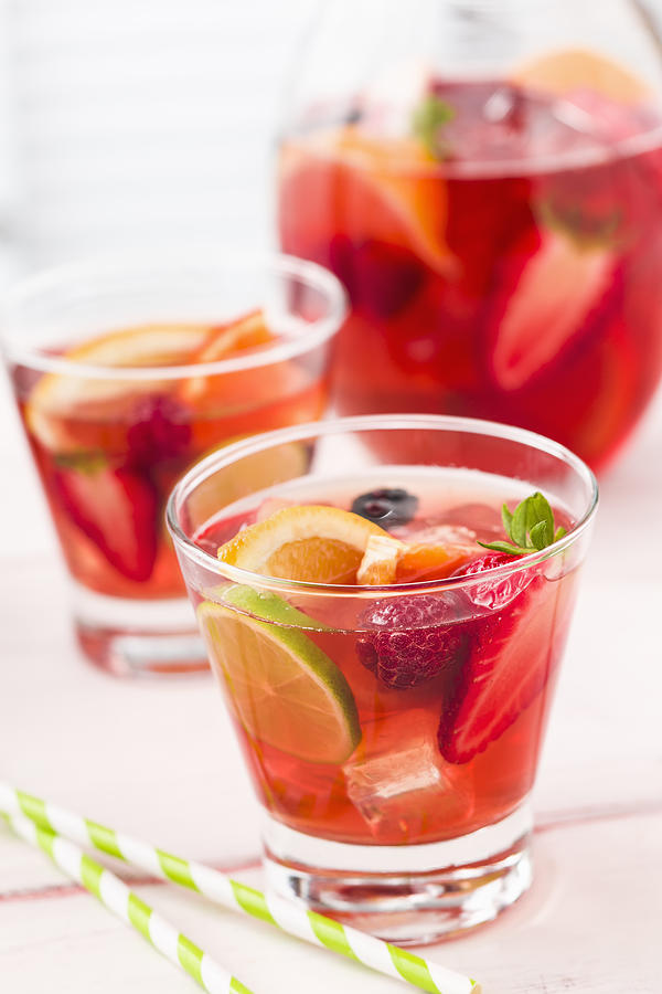 Fruit Punch with Strawberries, Raspberries Orange and Lime Photograph by GMVozd