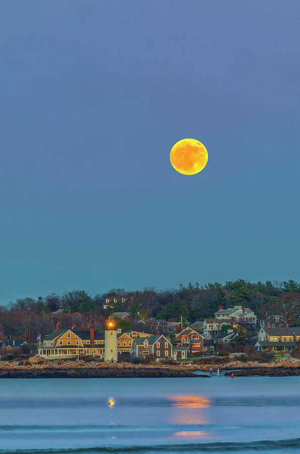 Full Beaver Moon Rise Behind Annisquam Harbor Lighthouse Photograph by Juergen Roth