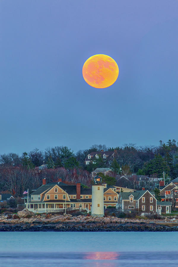 Full Beaver Moon Rising Behind Annisquam Harbor Lighthouse Photograph by Juergen Roth