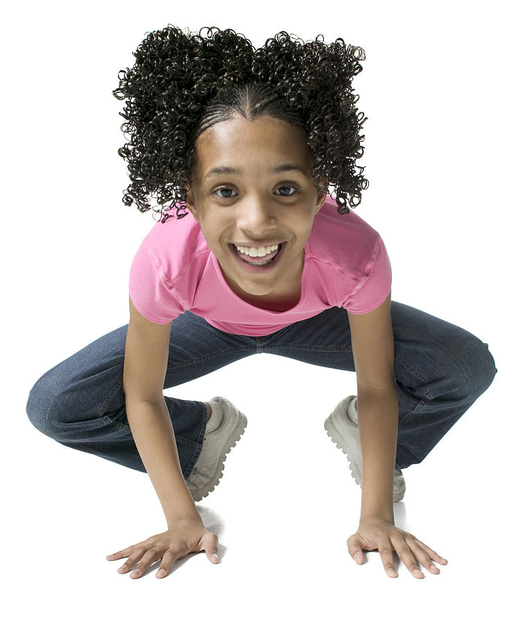 Full Body Shot Of A Female Child As She Leans Forward On All Fours And Smiles Photograph by Photodisc