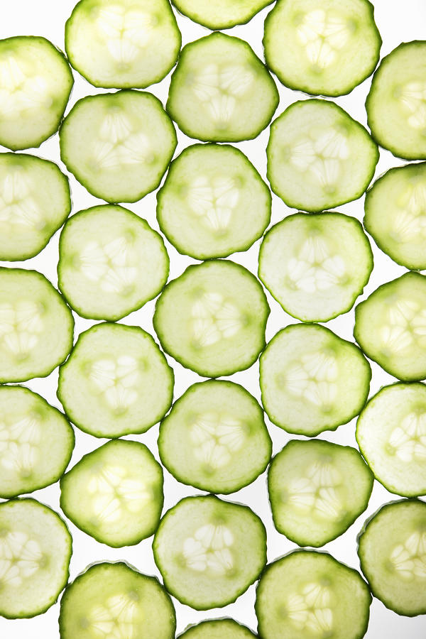 Full frame of cucumber slices Photograph by Anthony Lee