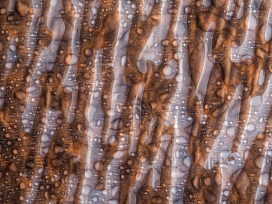 Full frame of the textures formed by the bubbles and drops,  on a coarse brown background Photograph by Jose A. Bernat Bacete