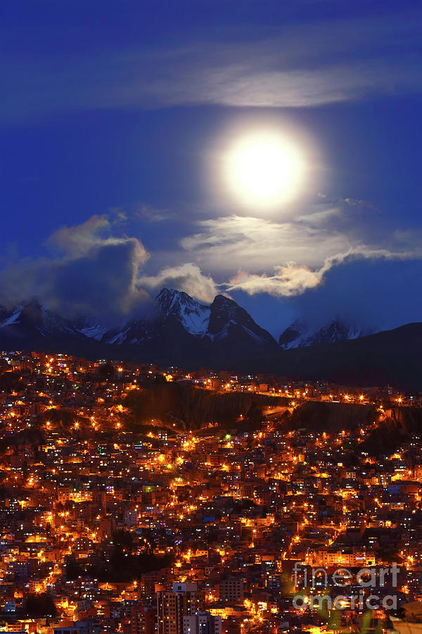 City Photograph - Full moon above the clouds and city lights La Paz Bolivia by James Brunker