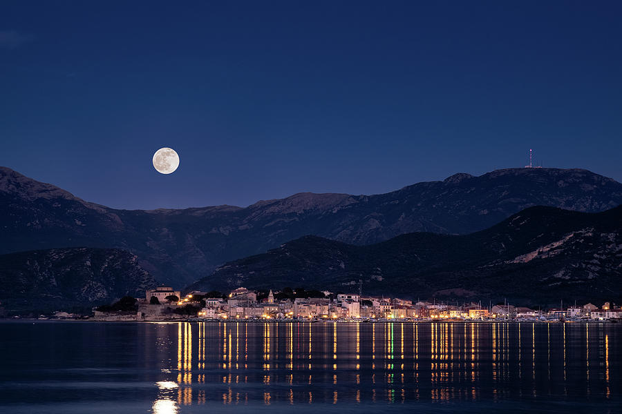 Moon rising over Calvi Bay in Corsica Weekender Tote Bag by Jon Ingall -  Pixels