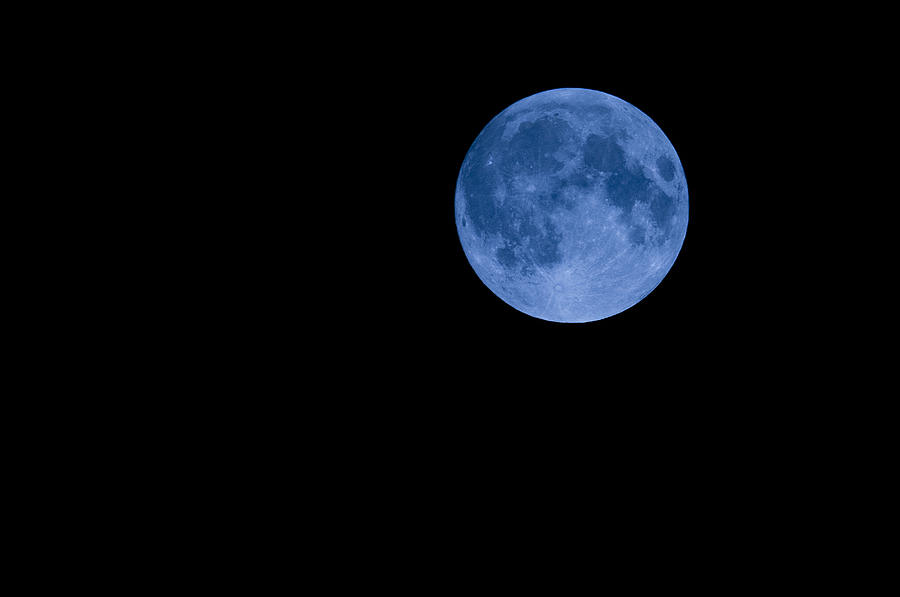 Full moon Photograph by PhotoAlto/Frederic Cirou