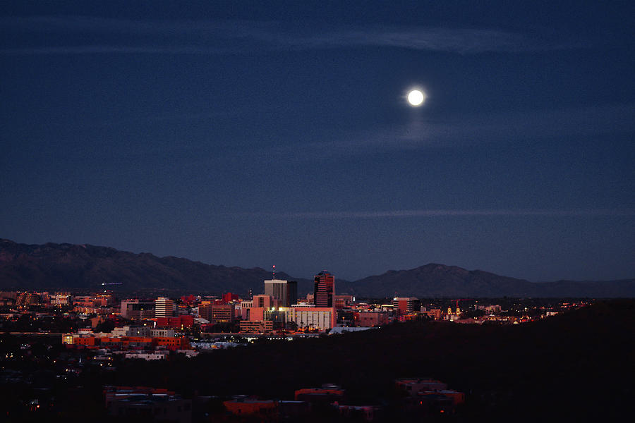 Full moon rises over downtown Tucson, Arizona Photograph by Chance Kafka