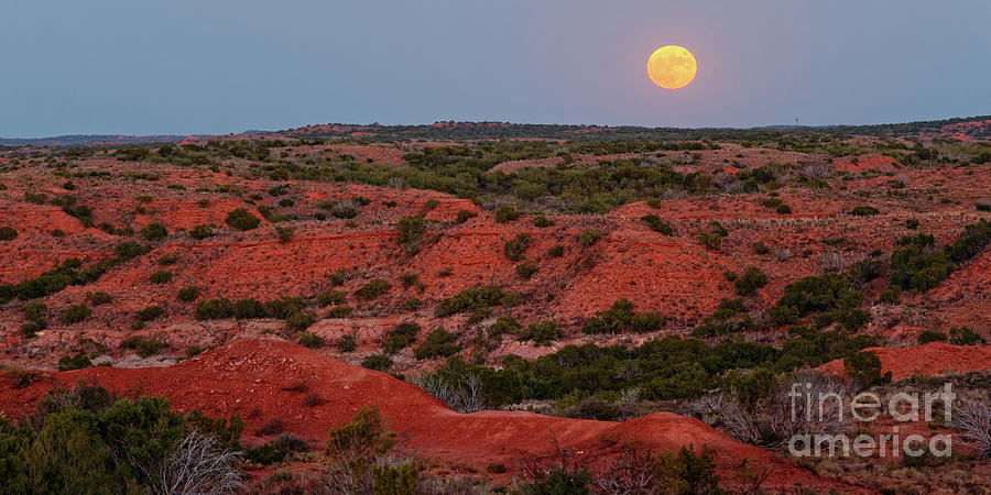 Full Moon Rising Over the Red Rock Landscape of Caprock Canyons State Park Quitaque Texas Panhandle Photograph by Silvio Ligutti