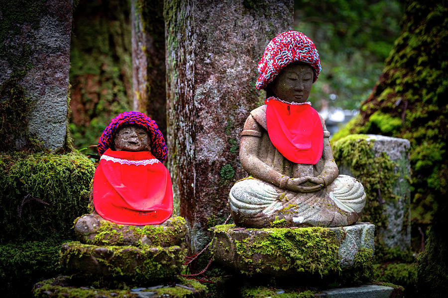 Okunoin Photograph - funerary statues with red decorations in the Okunoin cemetery  by Gualtiero Boffi