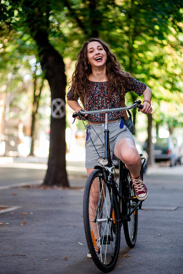 Funny Girl Riding A Street Bicycle Photograph by Kosamtu