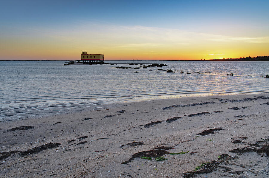 Fuzeta beach sunset scenery and landmark. Portugal Photograph by Angelo DeVal