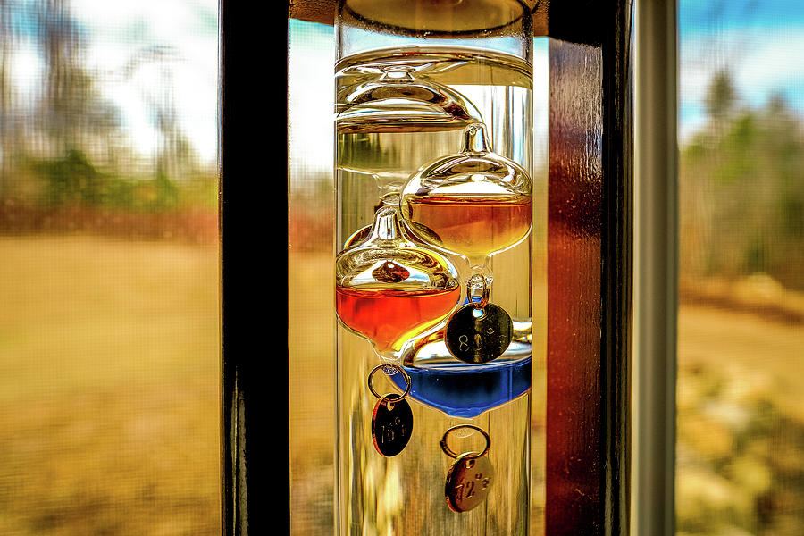 Galileo Thermometer In The Window, Photograph by Jeff Sinon