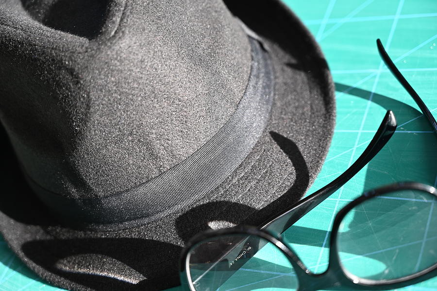 Gangster Fedora And Black Rimmed Work Glasses Colour Photograph
