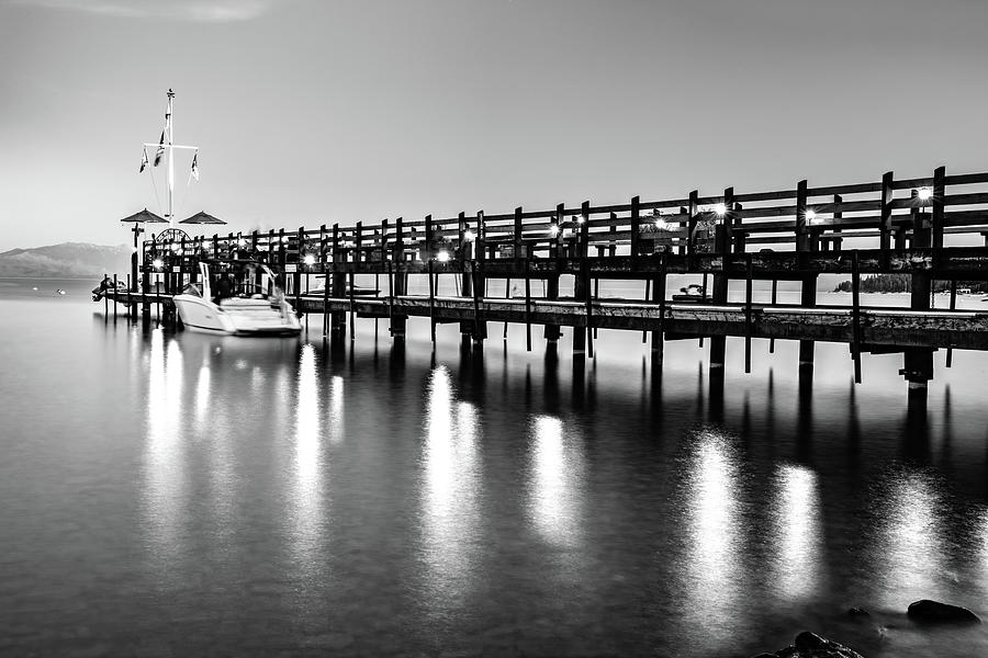 Black And White Photograph - Gar Woods Pier At Dusk On Lake Tahoe California - Black And White by Gregory Ballos