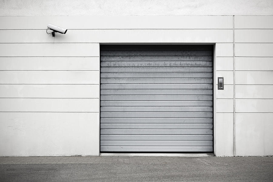 Garage door Photograph by LordRunar