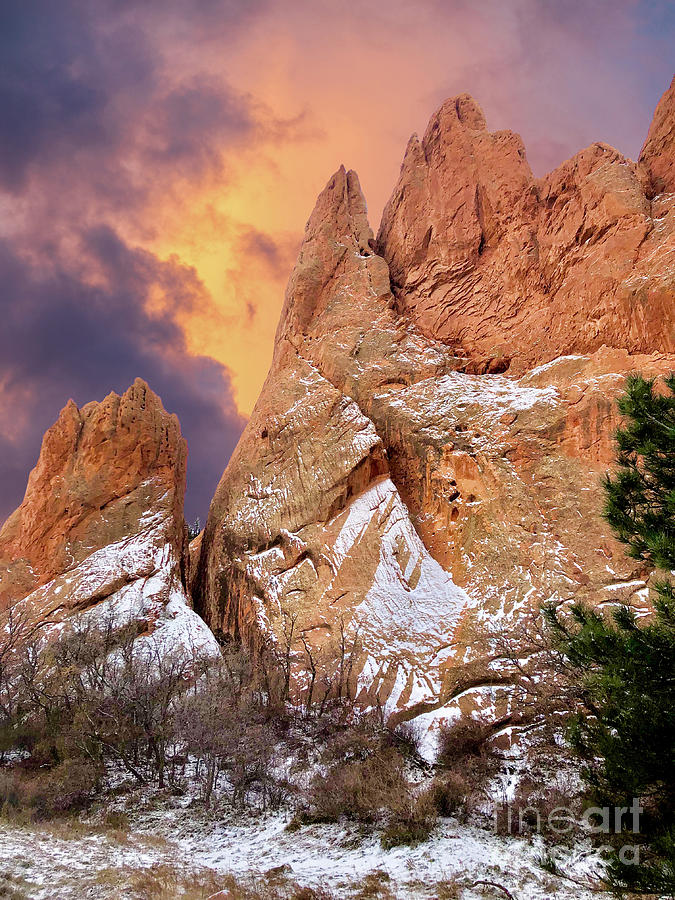 Garden of the Gods during a snow storm with beautiful contrasting white snow against the red rocks. Photograph by Gunther Allen