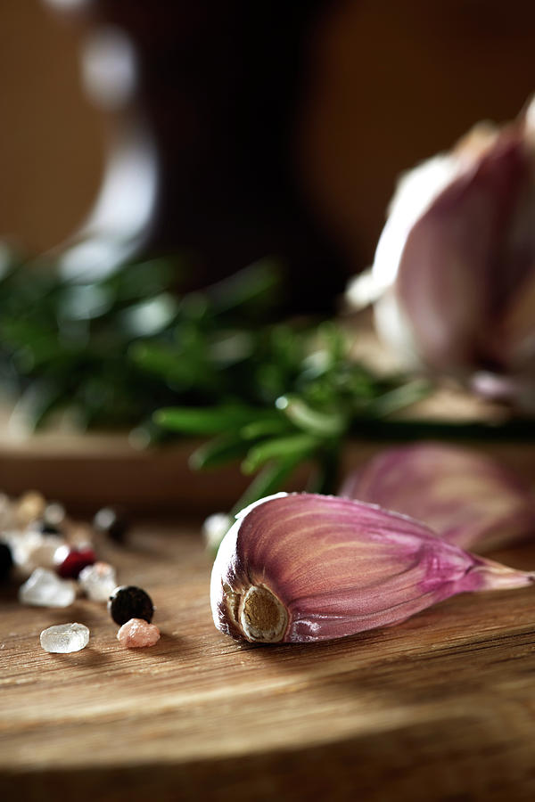 Garlic, sea salt and colored peppercorns Photograph by Sebastian Radu