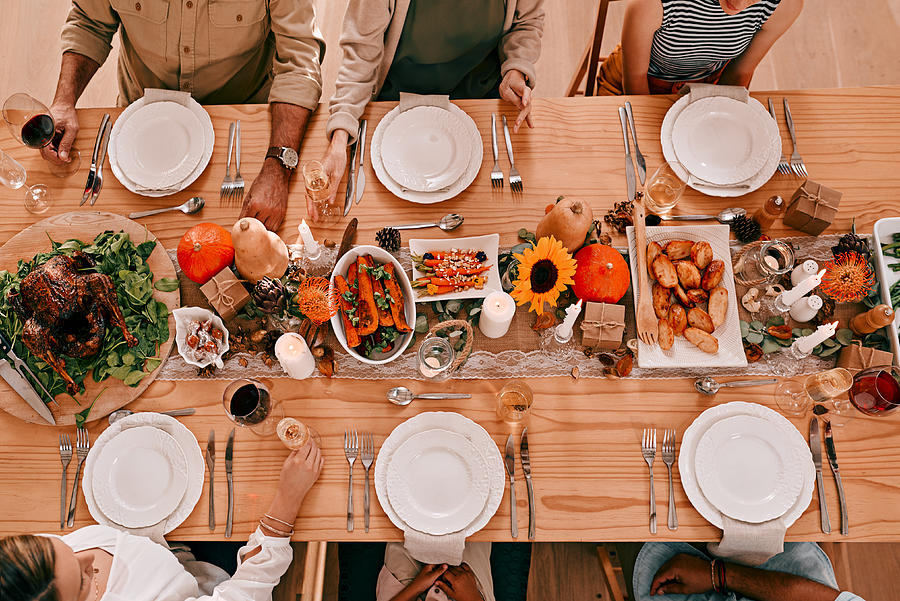 Gather around the table, its time to give thanks Photograph by PeopleImages