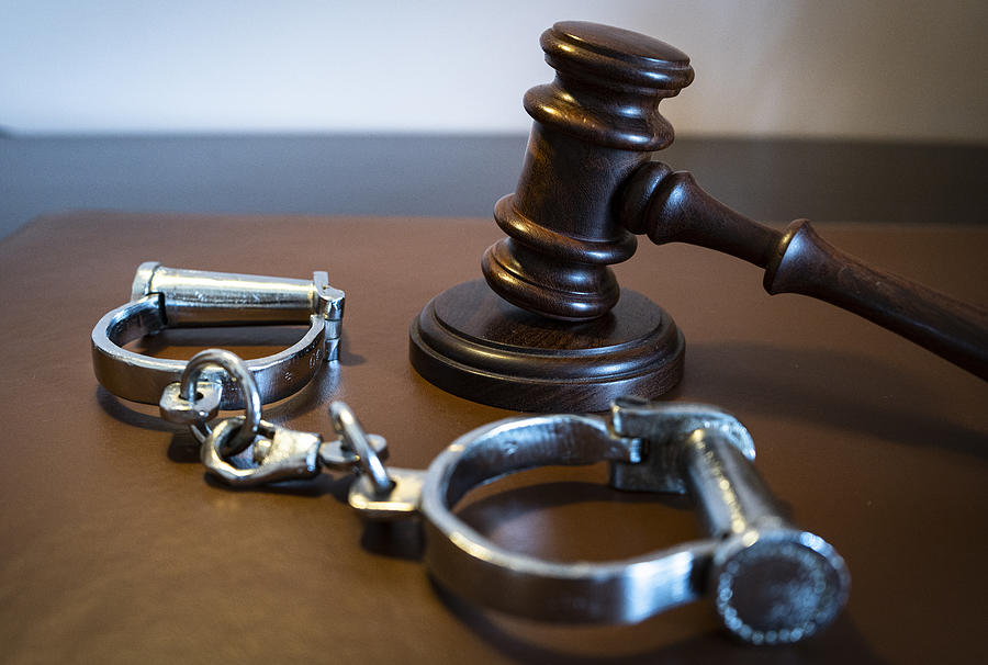 Gavel and handcuffs Photograph by David Talukdar Gavel and handcuffs Photograph by David Talukdar