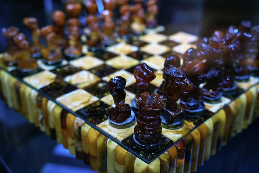 Gdansk, North Poland -  Close up of a chess board game made of pure amber Photograph by Arpan Bhatia