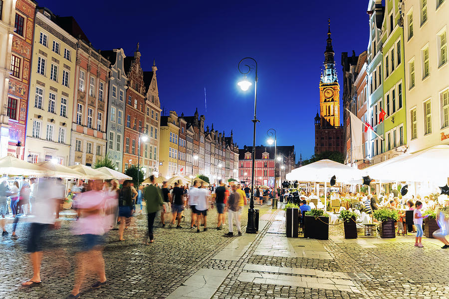 Gdansk, North Poland - Night photography of people walking in motion ...