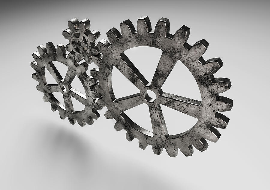 Gear wheels from rusty metal. Photograph by Ulzanna