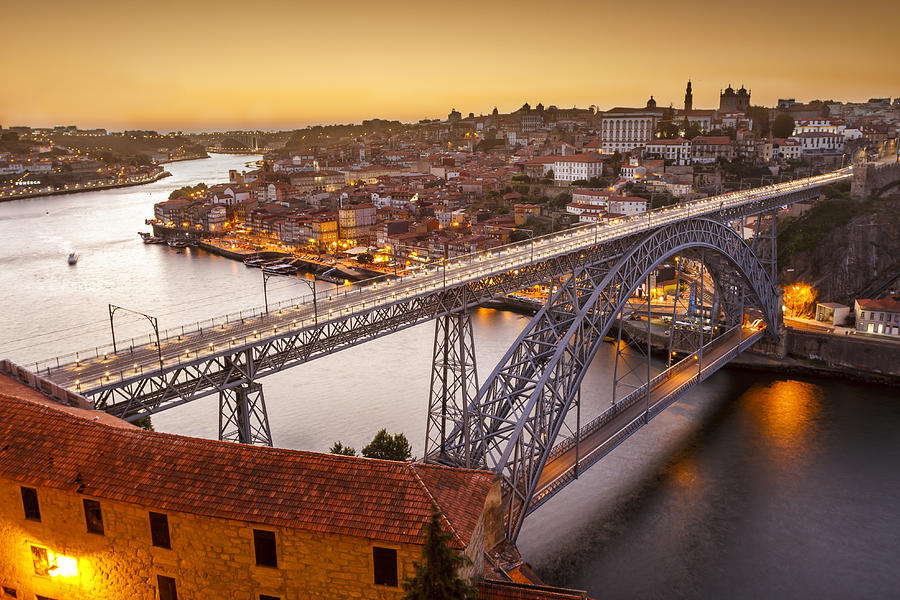General view of Douro river and city of Oporto al sunset. Porto (Oporto), Portugal Photograph by Jose m. Alvarez