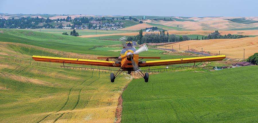 Genesee Crop Dusting. Photograph by Doug Davidson