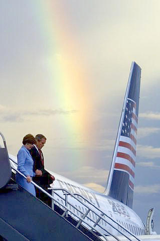 George and Laura Bush and Rainbow Photograph by Rick Wilking