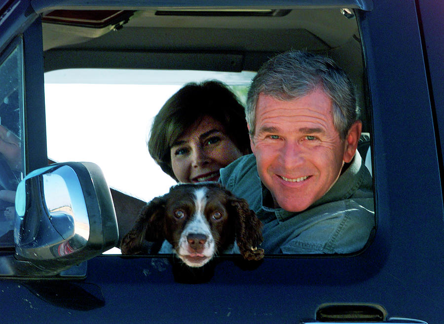 George Bush and Laura in Truck Photograph by Rick Wilking
