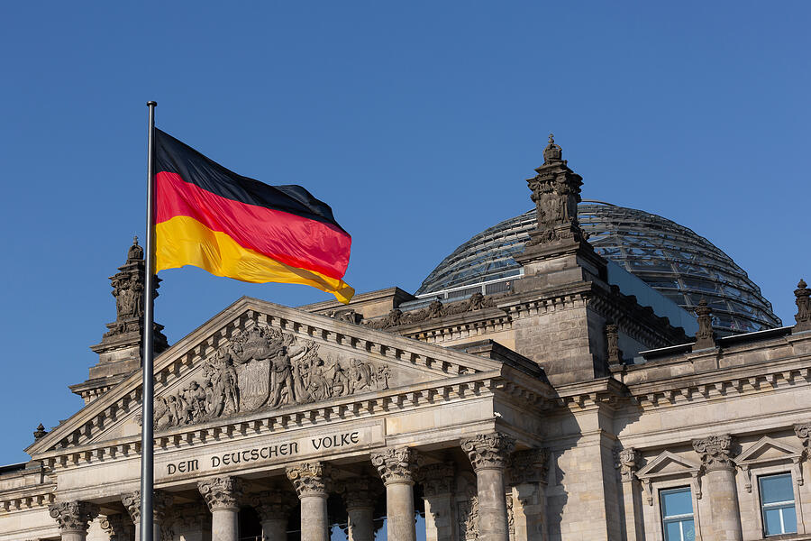 German flag with dome of the Reichstag building (Deutscher Bundestag/ German parliament building) Photograph by Fhm German flag with dome of the Reichstag building (Deutscher Bundestag/ German parliament building) Photograph by Fhm