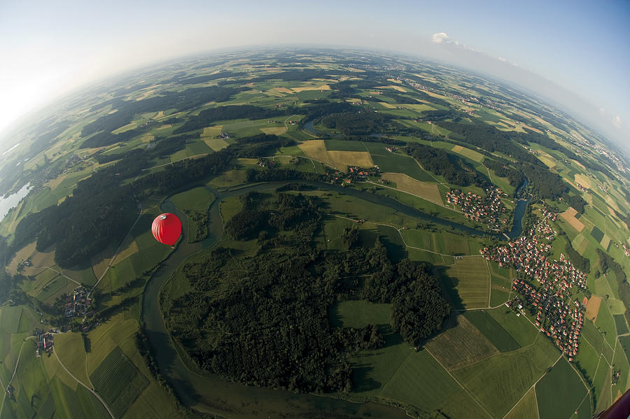 Germany, Bavaria, View of hot air balloon over pasture landscape Photograph by Westend61