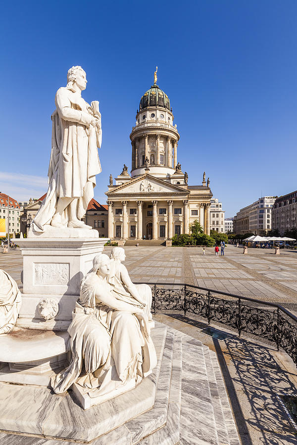 Germany, Berlin, Gendarmenmarkt, view to French Cathedral with statue of Friedrich Schiller in the foreground Photograph by Westend61