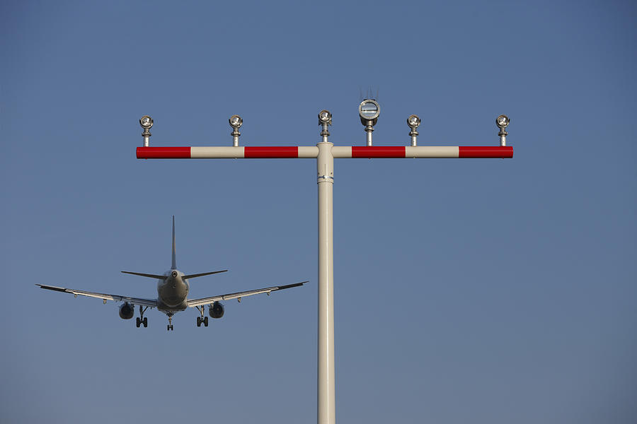 Germany, Frankfurt, Aeroplane landing on airport Photograph by Westend61