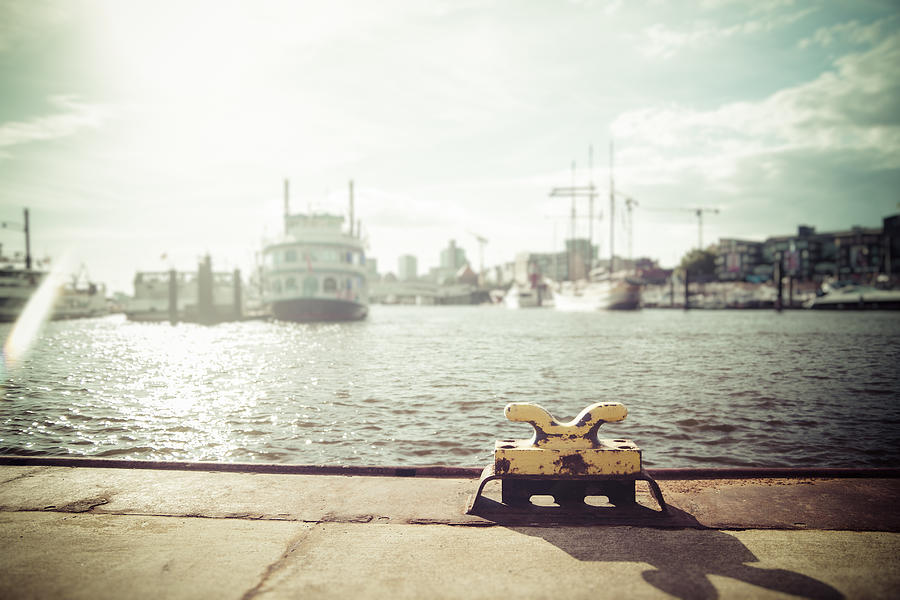 Germany, Hamburg, Port of Hamburg, Elbe river, Bollard against the sun Photograph by Westend61