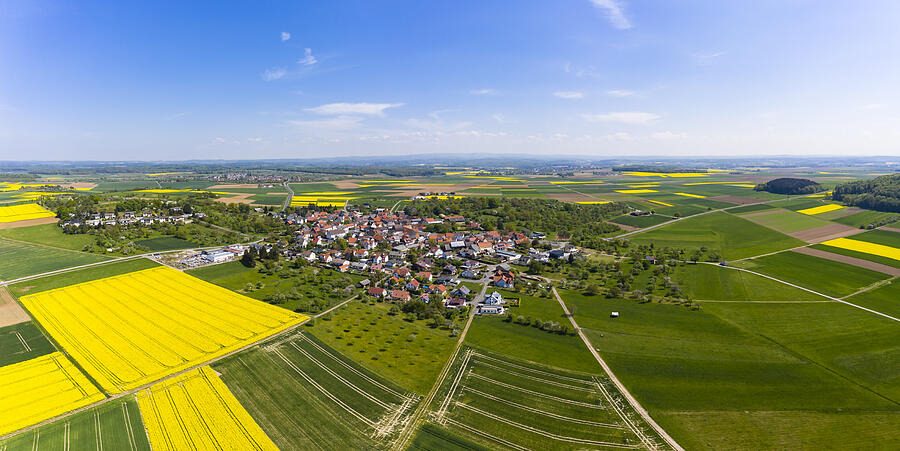 Germany, Hesse, Munzenberg, Helicopter panorama of countryside village and surrounding fields in summer Photograph by Westend61