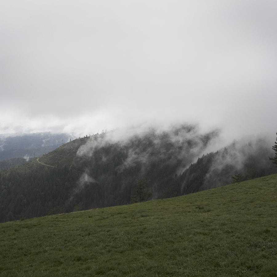 Germany, Schwarzwald, mountains in clouds Photograph by Thomas Northcut