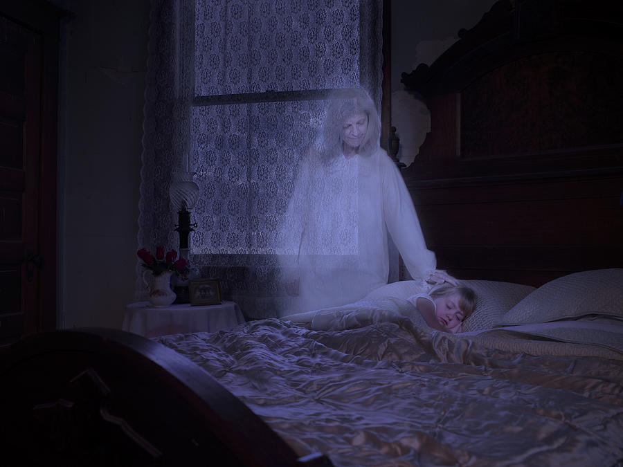 Ghost touching sleeping granddaughter Photograph by Ralf Nau