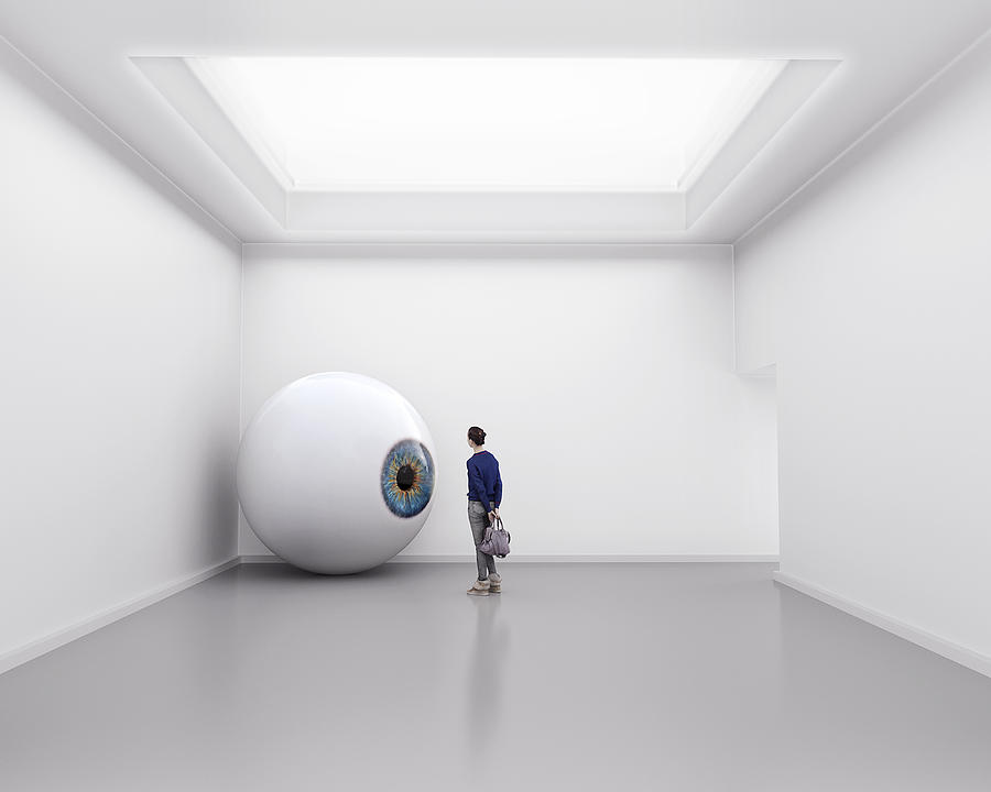 Giant eye in gallery room Photograph by Timandtim