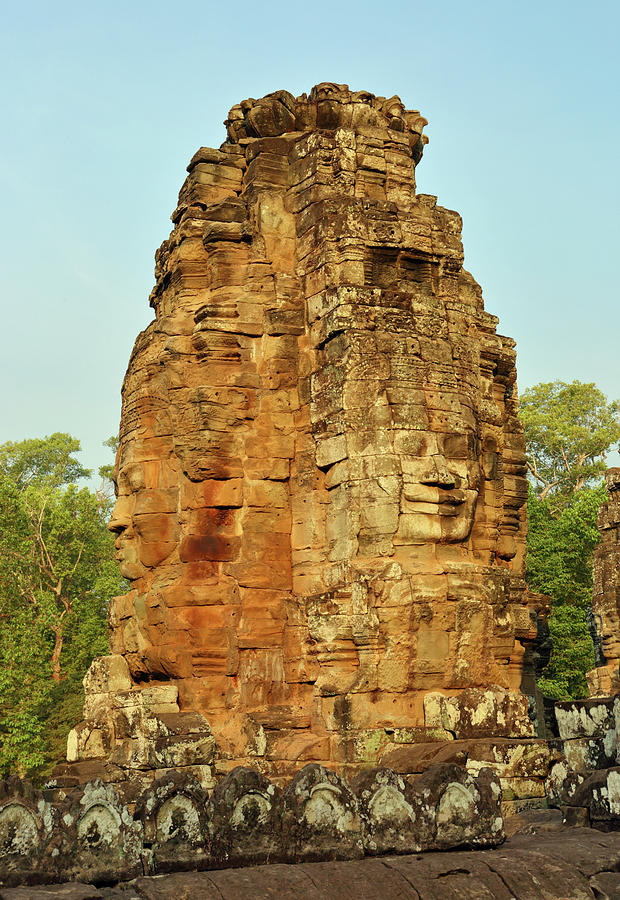 Giant stone faces at Bayon Temple in Cambodia Photograph by Mikhail Kokhanchikov
