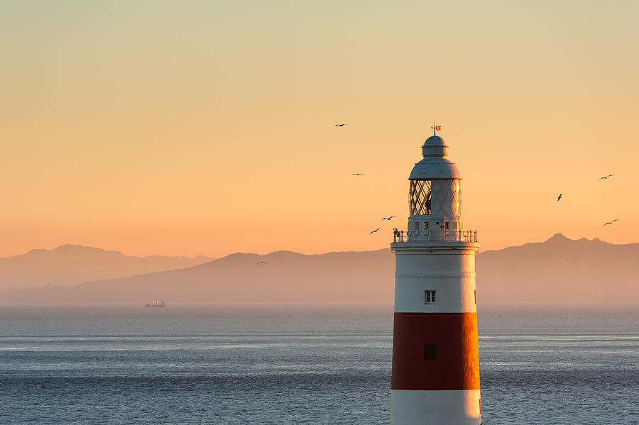 Gibraltar Lighthouse at sunset Photograph by © Allard Schager