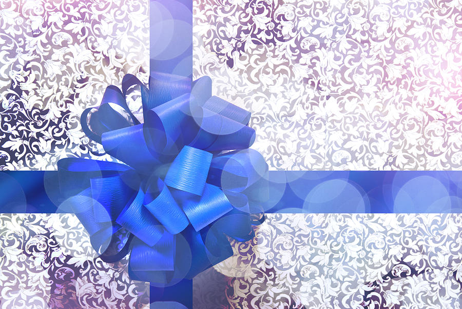 Gift with blue bow and ribbon Photograph by artJazz
