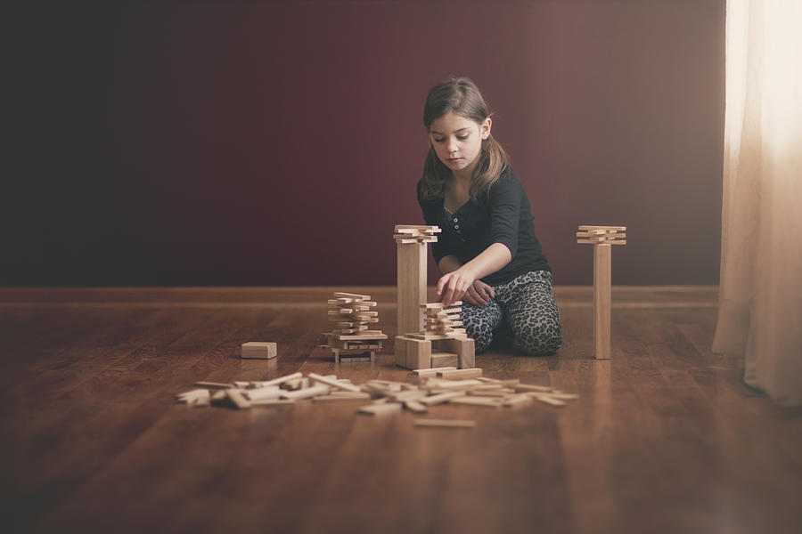 Girl Building With Wooden Blocks Photograph by Rebecca Nelson