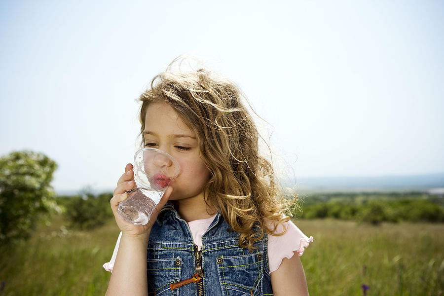 Girl drinking water Photograph by Chev Wilkinson