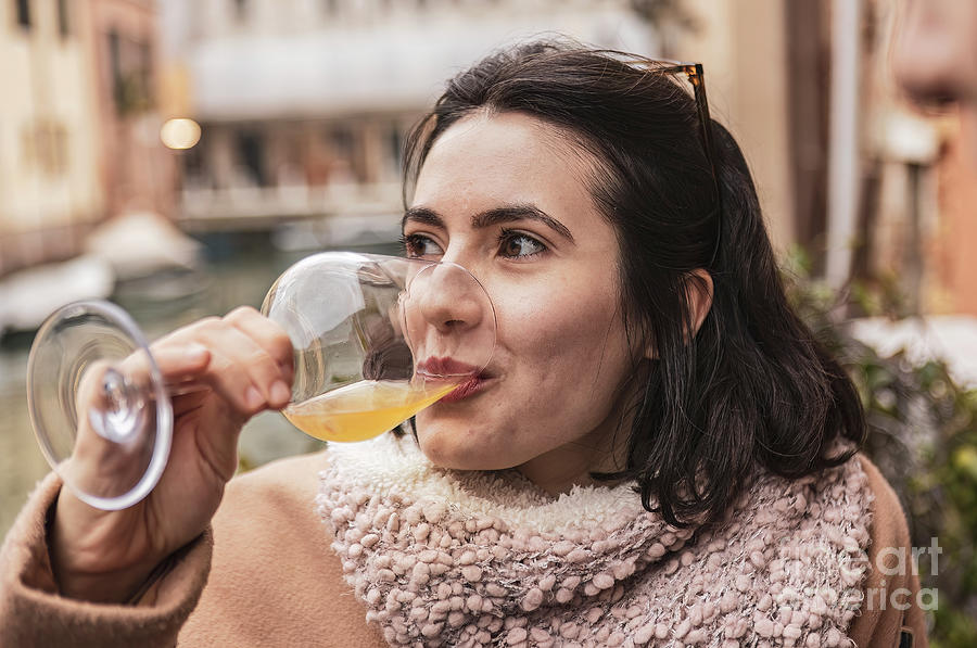 Girl drinks glass of wine Photograph by Filippo Carlot - Fine Art America