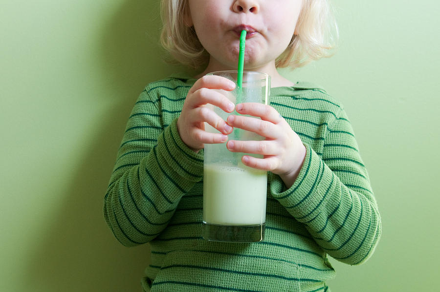 Girl in Green Sipping Green Milkshake Photograph by Photo by Mary MacAskill