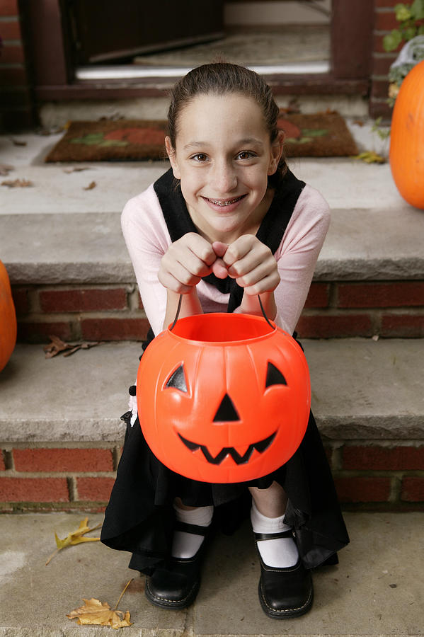 Girl in Halloween costume Photograph by Comstock Images