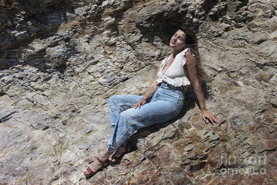 Girl Lounging On Rocks Photograph