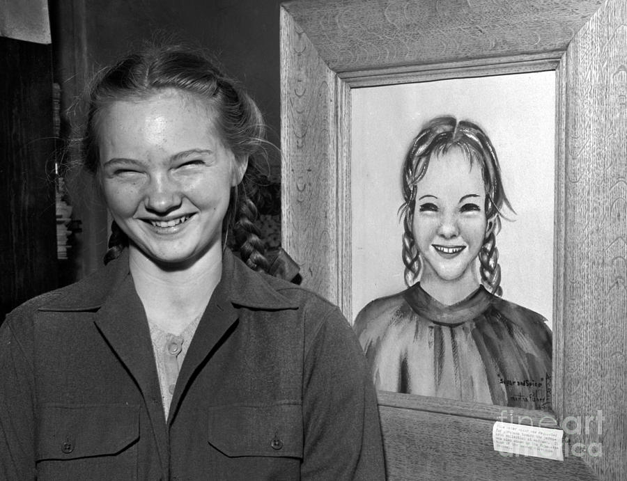 Girl Posing with Portrait Photograph by The Harrington Collection