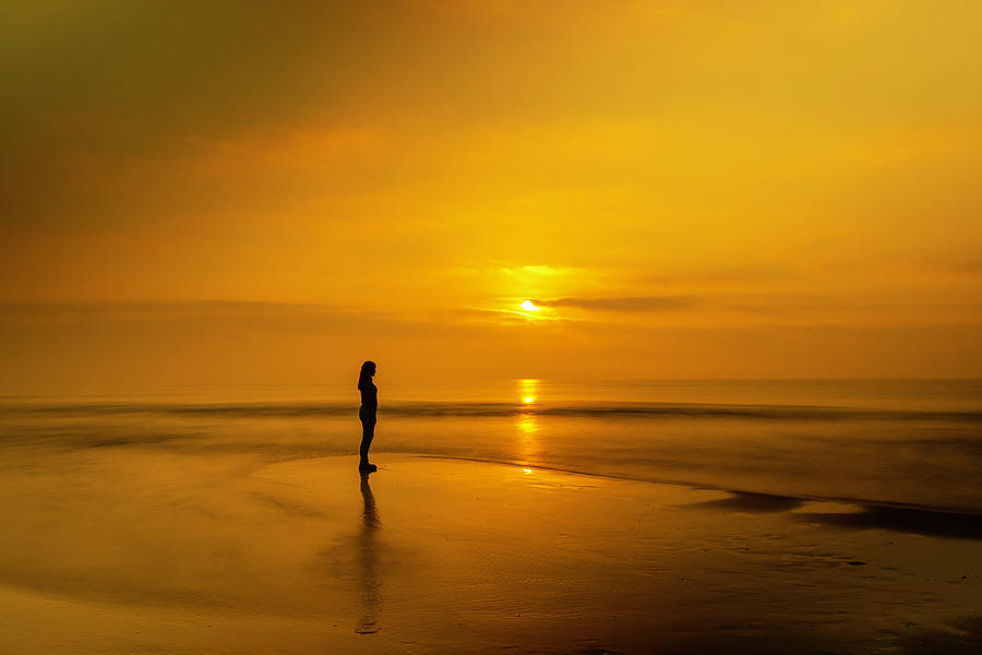 Girl watching sunrise in the sea Photograph by Marc Oriol - Fine Art ...